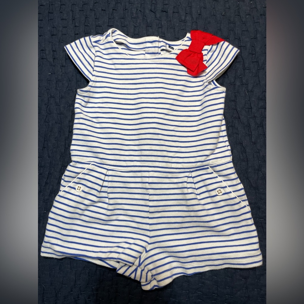 Janie & Jack romper, blue and white stripes with red bow in size 4.